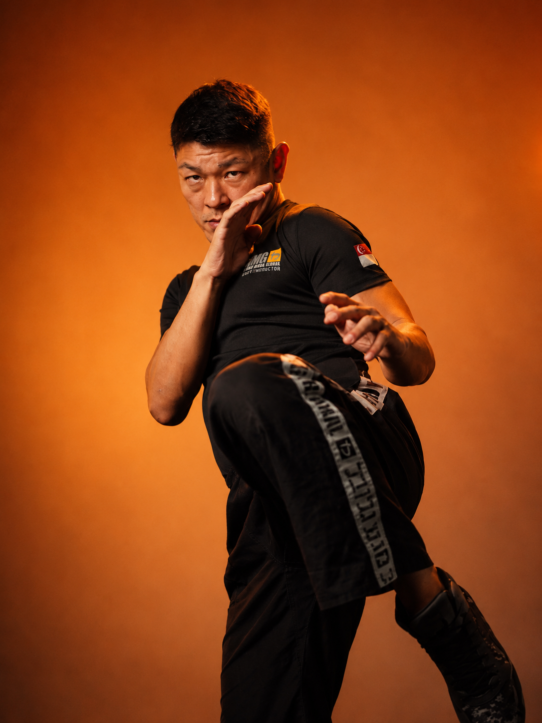 Edwin Peng training a round kick
