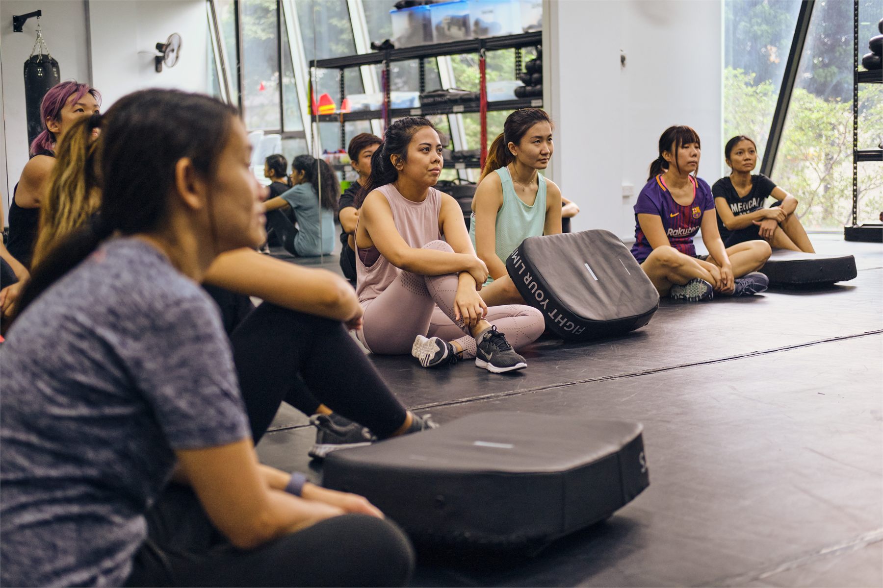 Women listening during a Kravist Women's Division class